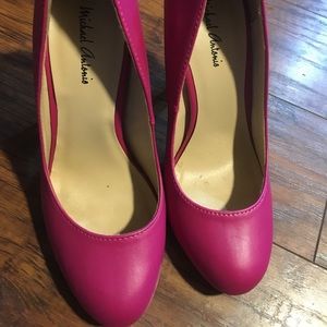Hot pink pumps
